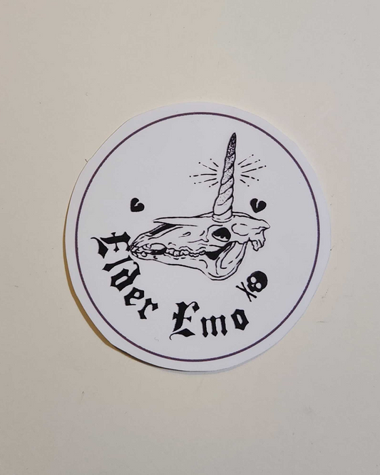 Circular logo with unicorn skull on a white background