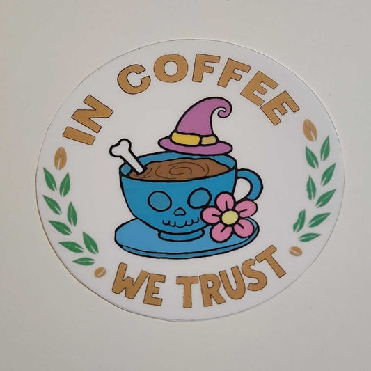 Circular sticker with cartoon character and text 'IN COFFEE WE TRUST' on a white background
